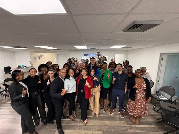 The team together after a training session in the Pompano Beach office