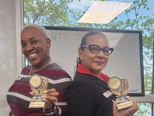 BTT leaders presenting awards to team members